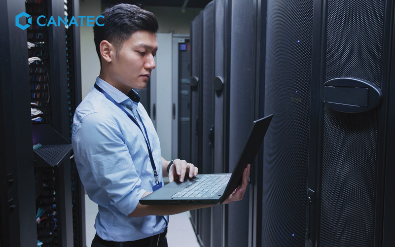 An employee inside a data storage room